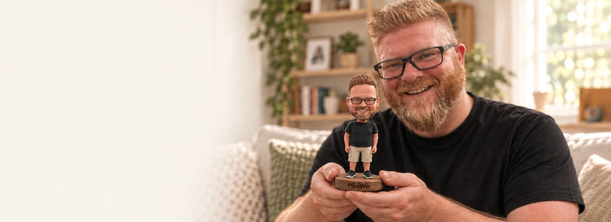 A man with his personalized figurine on a walnut base
