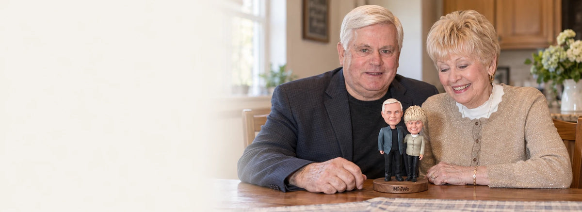 Two people with their personalized figurines