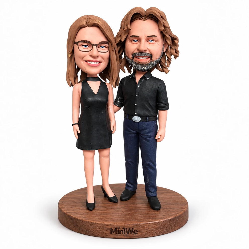 Two People figurine on a walnut base