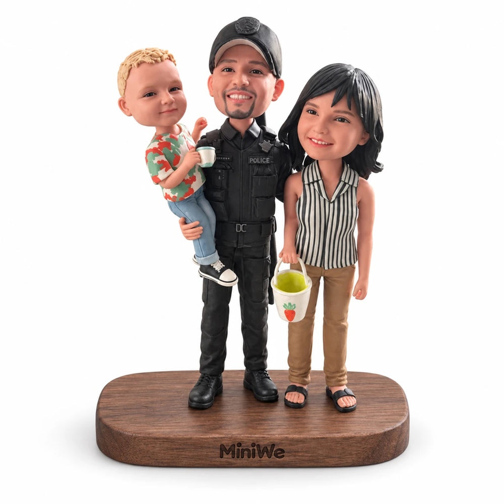 Three People figurine on a walnut base