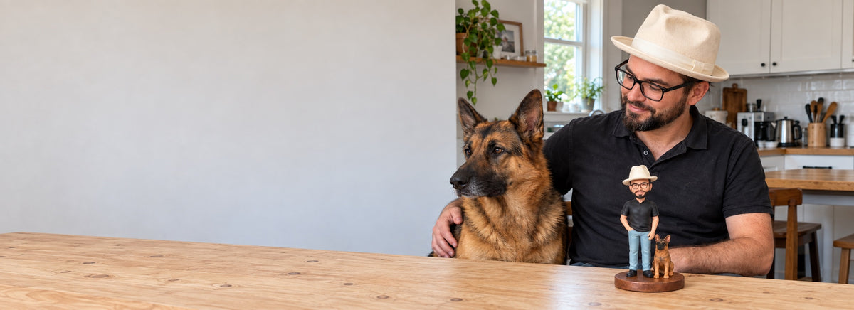 A person, a pet and their miniature figurine
